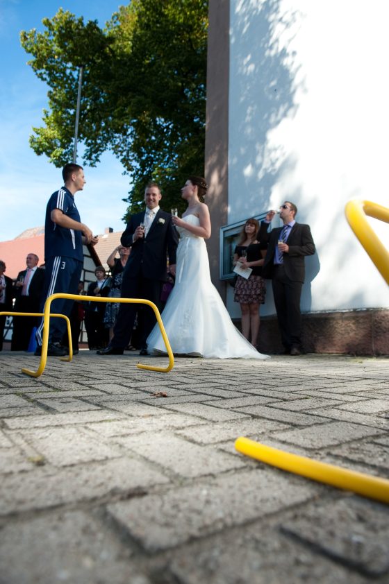 Wedding guests outdoors in sunny weather
